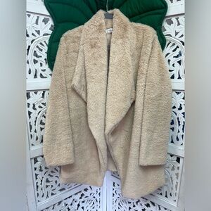 Mahina cream color faux fur coat. Size M. two pockets. Collar neckline.